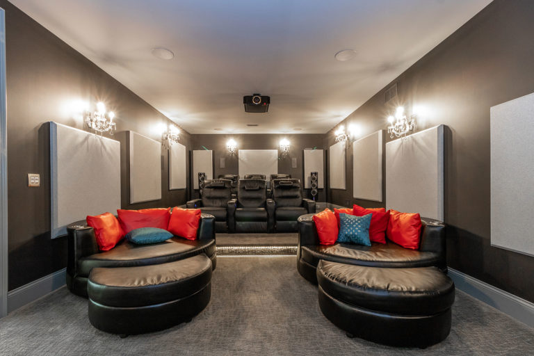 Media Room, Tiered Theater Seating and Luxurious ChairsPure Audio