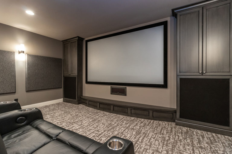 Media Room With Tiered Theater Seating And Full Wet Barpure Audio