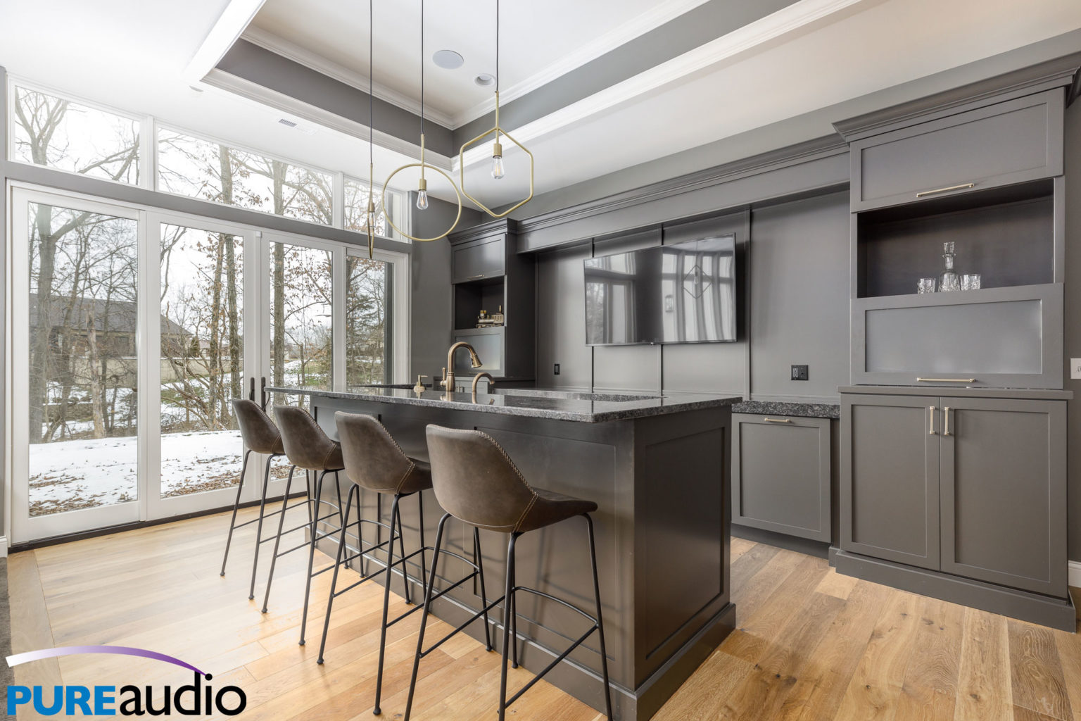 Wall Mounted TVs, In Ceiling Speakers and Outdoor Kitchen TV in